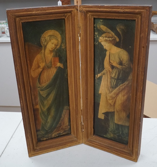 A diptych, colour prints, The Annunciation, overall 41cm high, housed in a folding gilt frame. Condition - fair